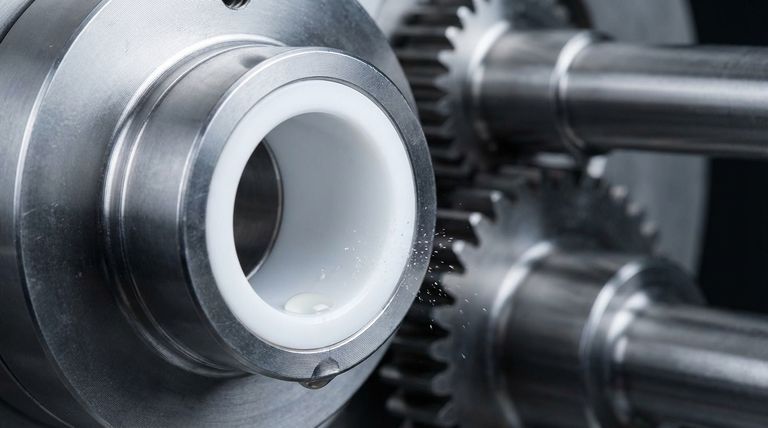 Como as propriedades antiaderentes dos mancais de Teflon beneficiam seu desempenho? Aumente a Confiabilidade e Reduza a Manutenção