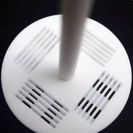 Close-up of PTFE flower basket assembly